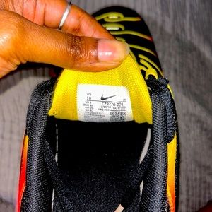 Red, yellow, and black Air Max